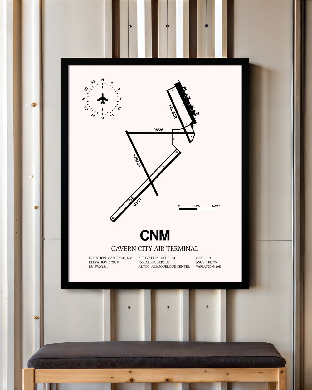Cavern City Air Terminal framed poster displayed in an airplane hangar