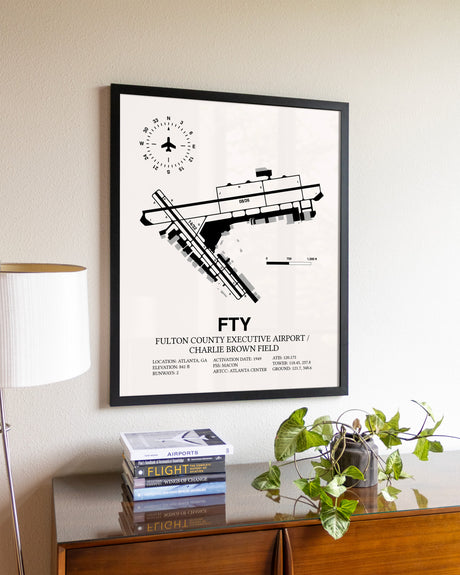 Fulton County Executive Airport / Charlie Brown Field aviation wall décor in black wood frame