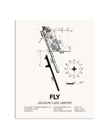Gray Meadow Lake Airport framed poster displayed in an airplane hangar