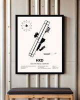 Hilton Head Airport framed poster displayed in an airplane hangar