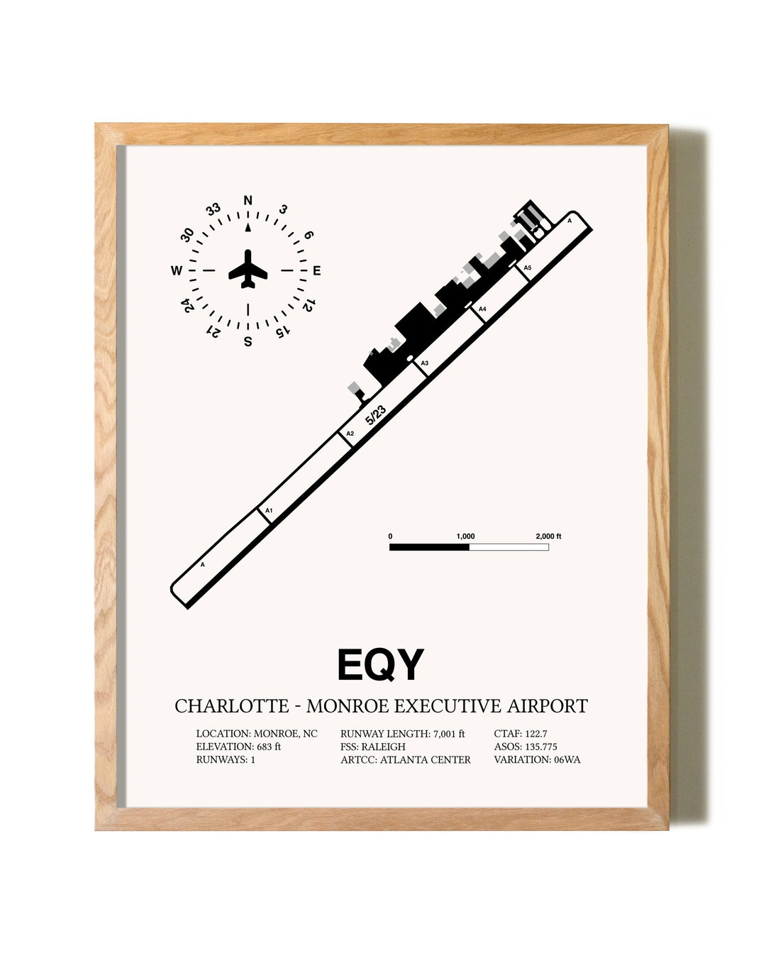 Charlotte-Monroe Executive Airport framed print in natural wood frame