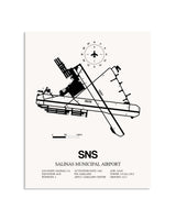 Gray Salinas Municipal Airport framed poster displayed in an airplane hangar