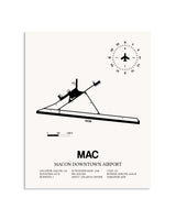 Gray Macon Downtown Airport framed poster displayed in an airplane hangar