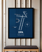 DuPage Airport framed poster displayed in an airplane hangar