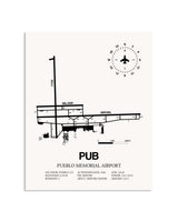 Gray Pueblo Memorial Airport framed poster displayed in an airplane hangar
