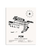 Gray Flying Cloud Airport framed poster displayed in an airplane hangar