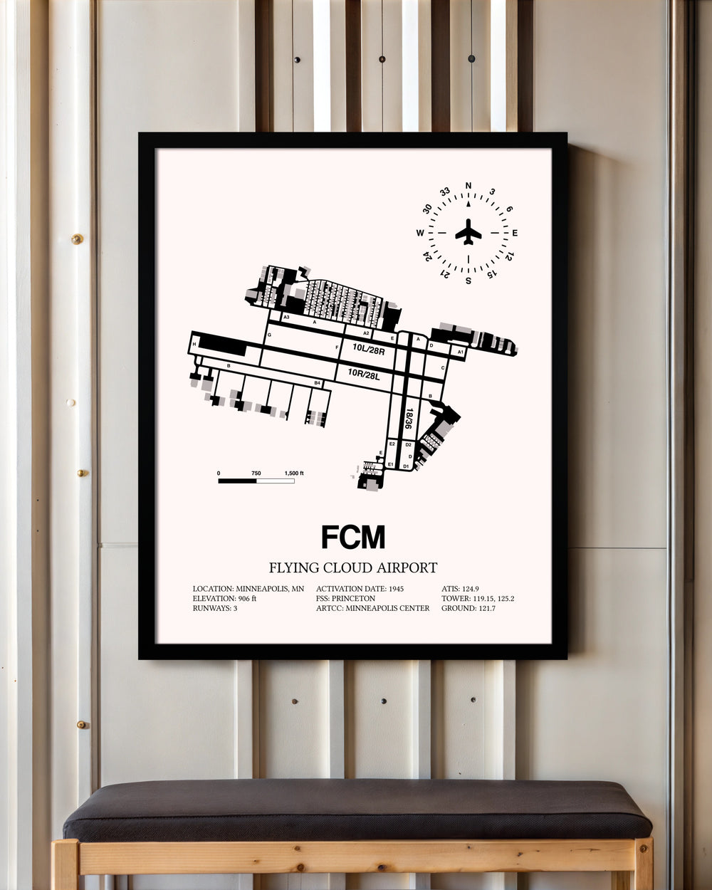 Flying Cloud Airport framed poster displayed in an airplane hangar