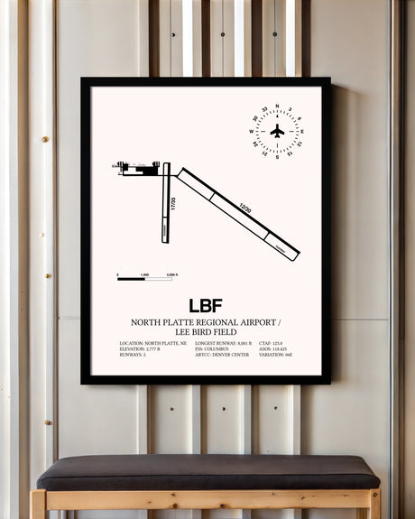 North Platte Regional Airport / Lee Bird Field framed poster displayed in an airplane hangar