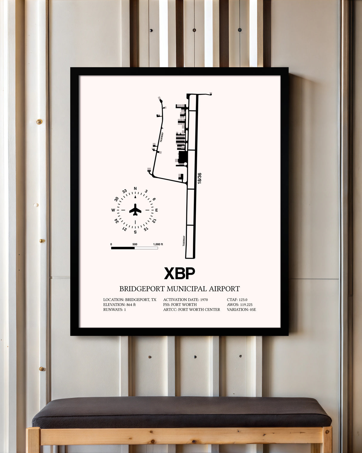 Bridgeport Municipal Airport framed poster displayed in an airplane hangar