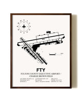 Fulton County Executive Airport / Charlie Brown Field aviation print in walnut frame