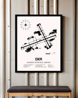 Danbury Municipal Airport framed poster displayed in an airplane hangar