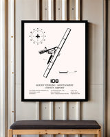Mount Sterling / Montgomery County Airport framed poster displayed in an airplane hangar