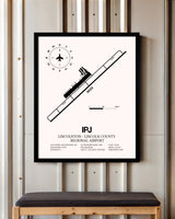 Lincolnton-Lincoln County Regional Airport framed poster displayed in an airplane hangar