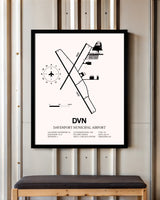 Davenport Municipal Airport framed poster displayed in an airplane hangar