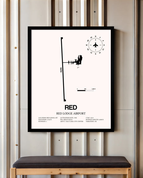 Red Lodge Airport framed poster displayed in an airplane hangar