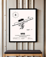 Eastern WV Regional Airport / Shepherd Field framed poster displayed in an airplane hangar