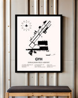 Donaldson Field Airport framed poster displayed in an airplane hangar