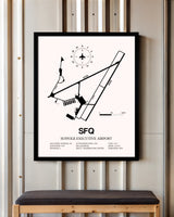 Suffolk Executive Airport framed poster displayed in an airplane hangar