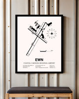 Coastal Carolina Regional Airport framed poster displayed in an airplane hangar