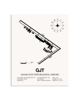 Gray Grand Junction Regional Airport framed poster displayed in an airplane hangar