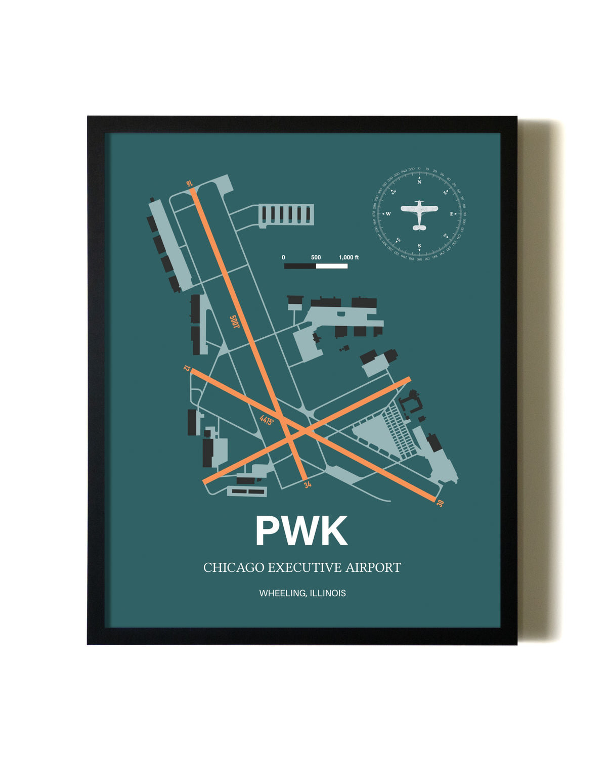 Green Chicago Executive Airport aviation wall décor in black wood frame