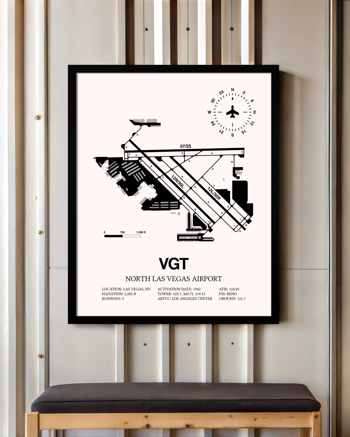 North Las Vegas Airport framed poster displayed in an airplane hangar