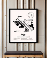 North Las Vegas Airport framed poster displayed in an airplane hangar