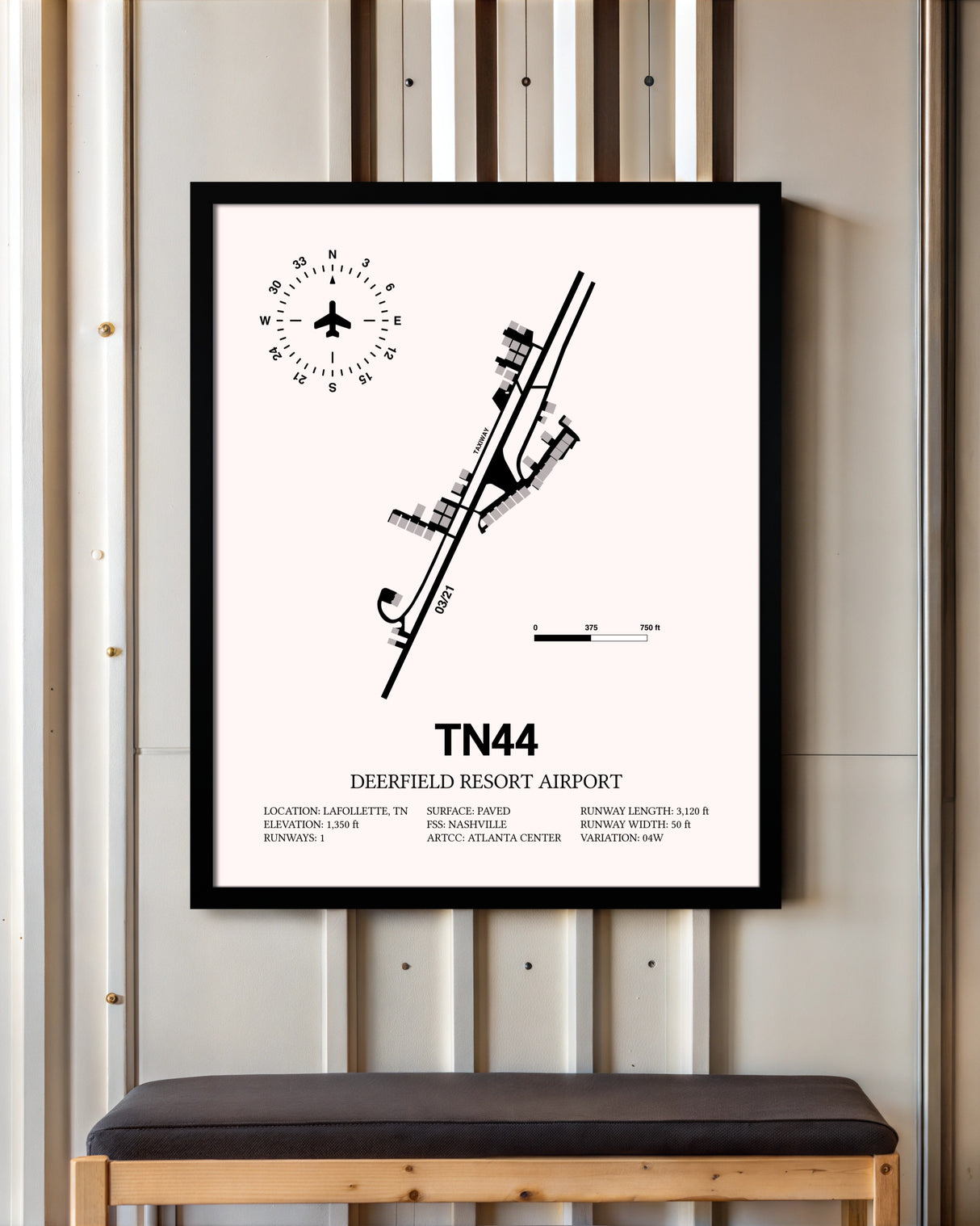 Deerfield Resort Airport framed poster displayed in an airplane hangar