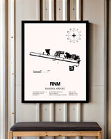 Ramona Airport framed poster displayed in an airplane hangar