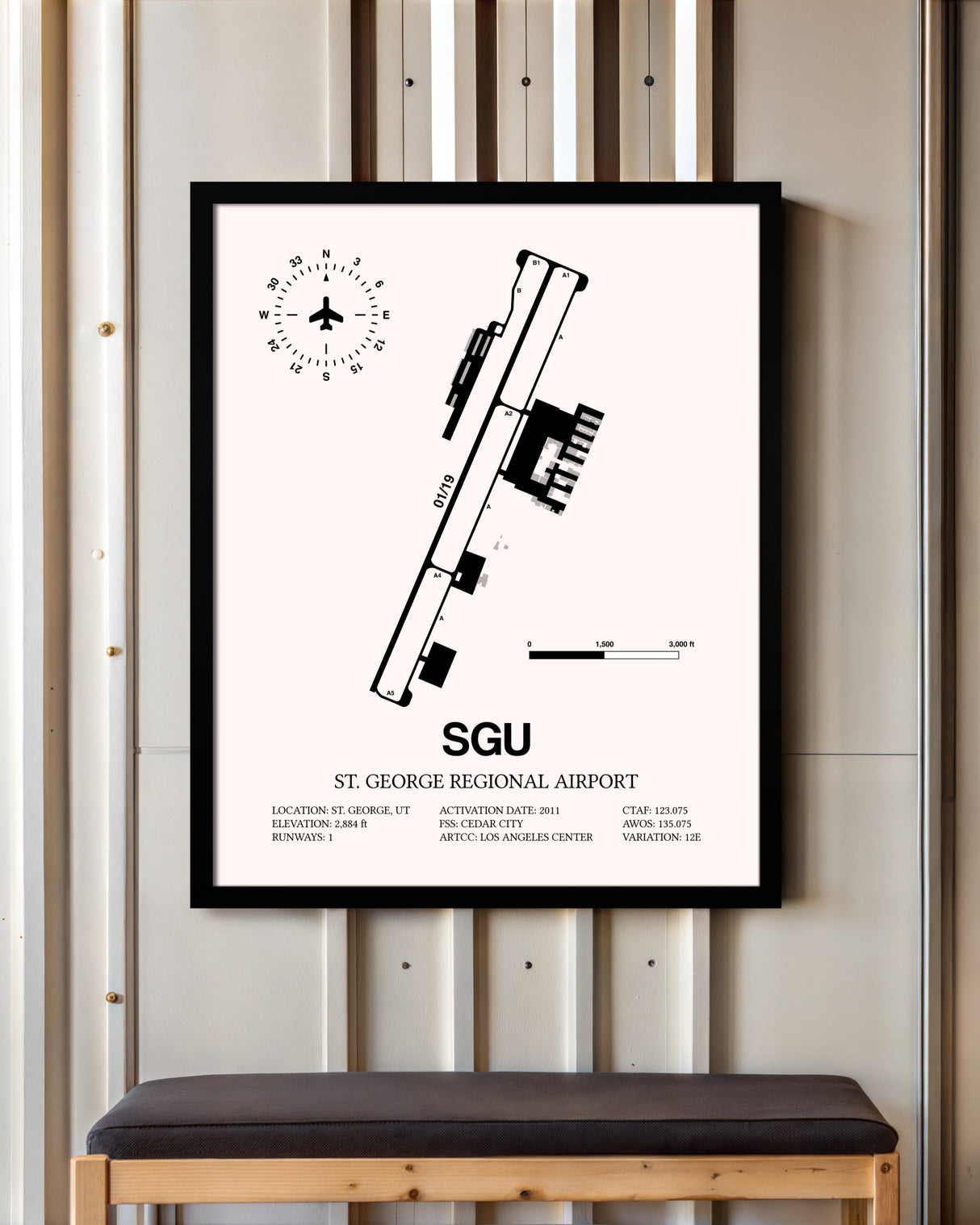 St. George Regional Airport framed poster displayed in an airplane hangar