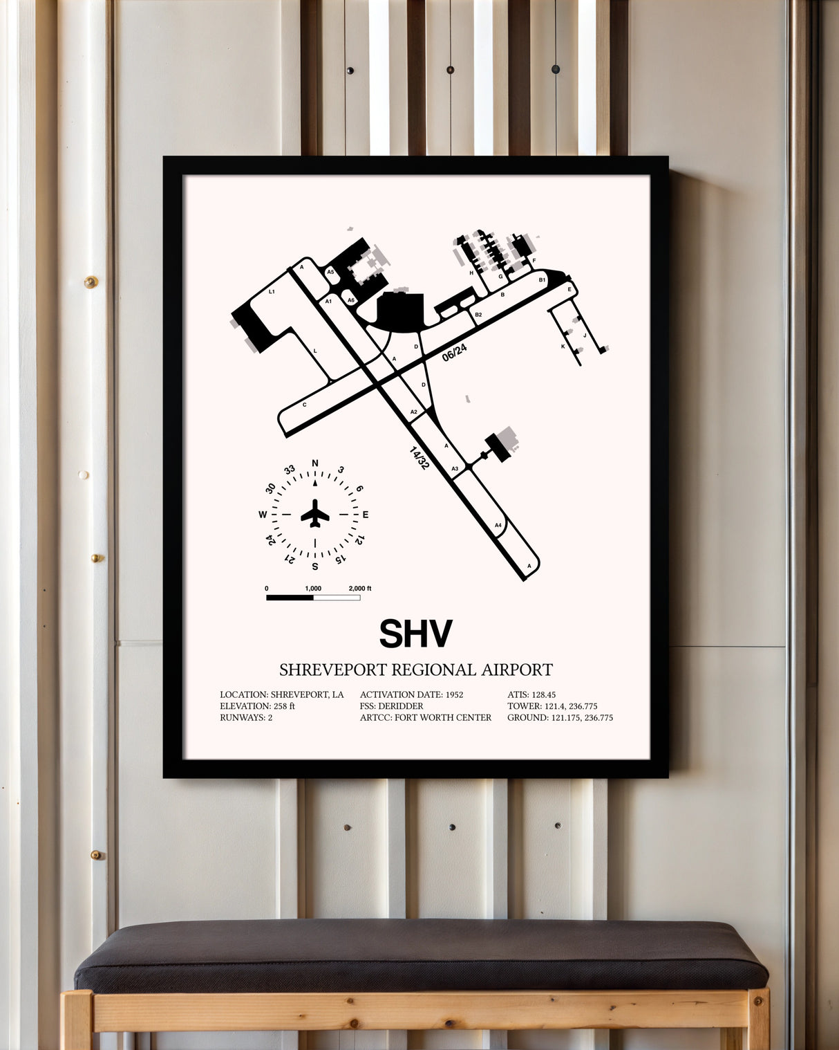 Shreveport Regional Airport framed poster displayed in an airplane hangar