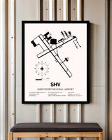 Shreveport Regional Airport framed poster displayed in an airplane hangar