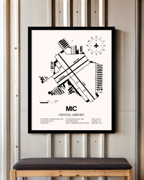 Crystal Airport framed poster displayed in an airplane hangar