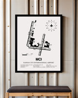 Framed Detailed Airport Map of Kansas City International Airport (MCI) in White with a Black Frame