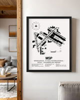 Framed Detailed Airport Map of Minneapolis-St Paul International/Wold-Chamberlain Airport (MSP) in White with a Black Frame