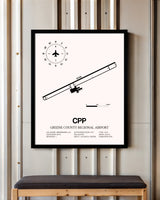 Greene County Regional Airport framed poster displayed in an airplane hangar