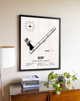Moore County Airport aviation wall décor in black wood frame