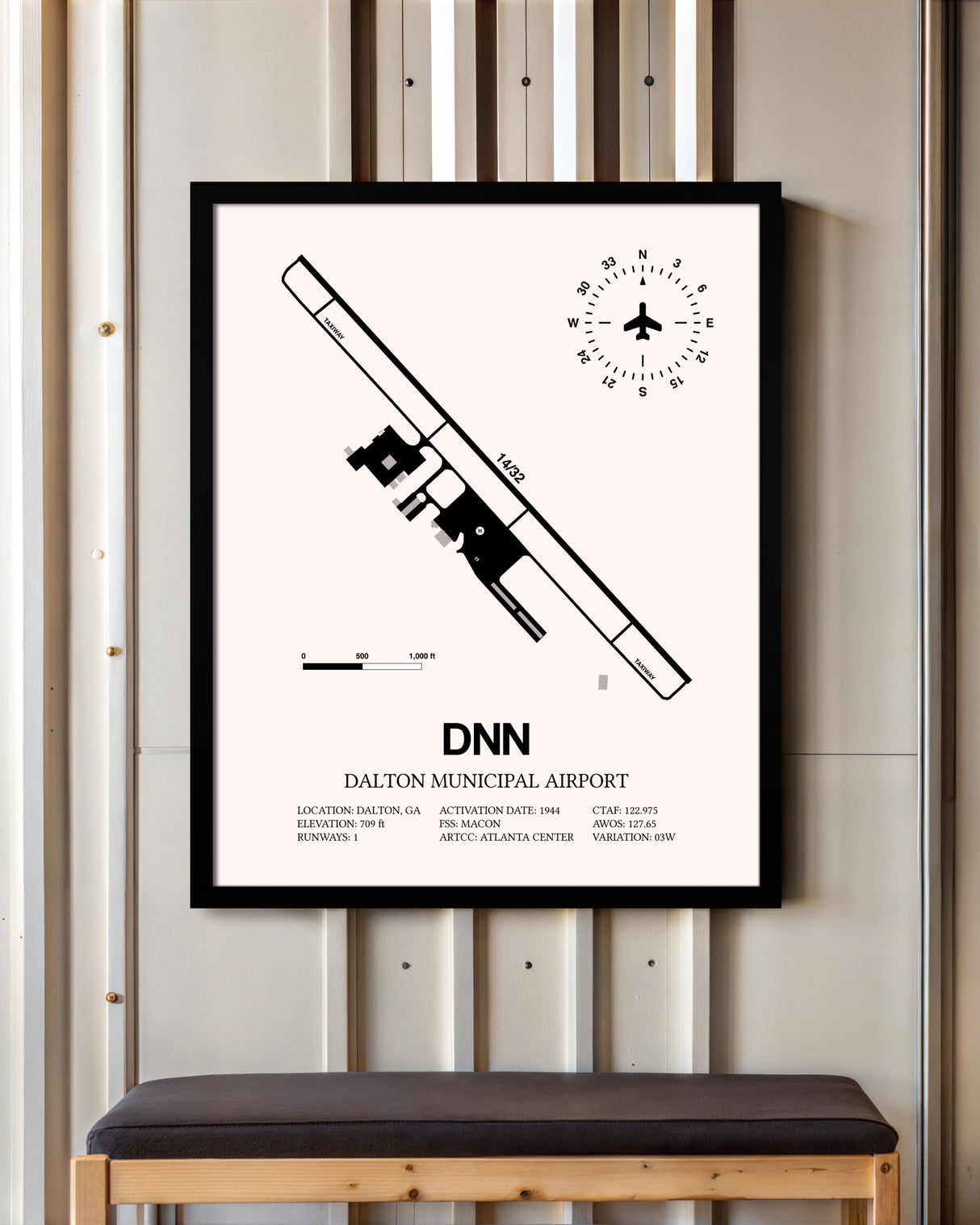 Dalton Municipal Airport framed poster displayed in an airplane hangar