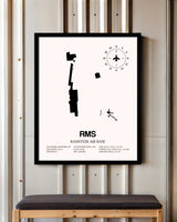 Ramstein Air Base framed poster displayed in an airplane hangar
