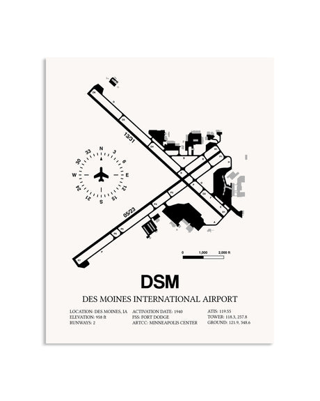 Gray Des Moines International Airport framed poster displayed in an airplane hangar