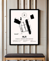 Yoakum-Defrenn Army Heliport framed poster displayed in an airplane hangar