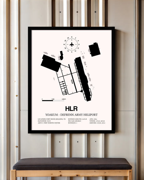 Yoakum-Defrenn Army Heliport framed poster displayed in an airplane hangar