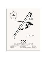 Gray Cedar City Regional Airport framed poster displayed in an airplane hangar
