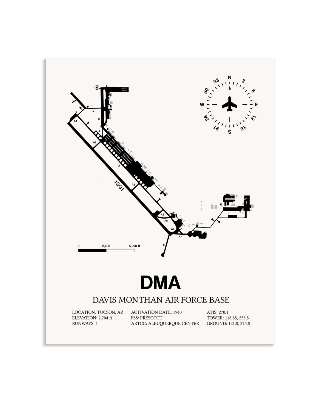 Gray Davis Monthan Air Force Base framed poster displayed in an airplane hangar