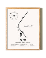 Richard I Bong Airport framed print in natural wood frame