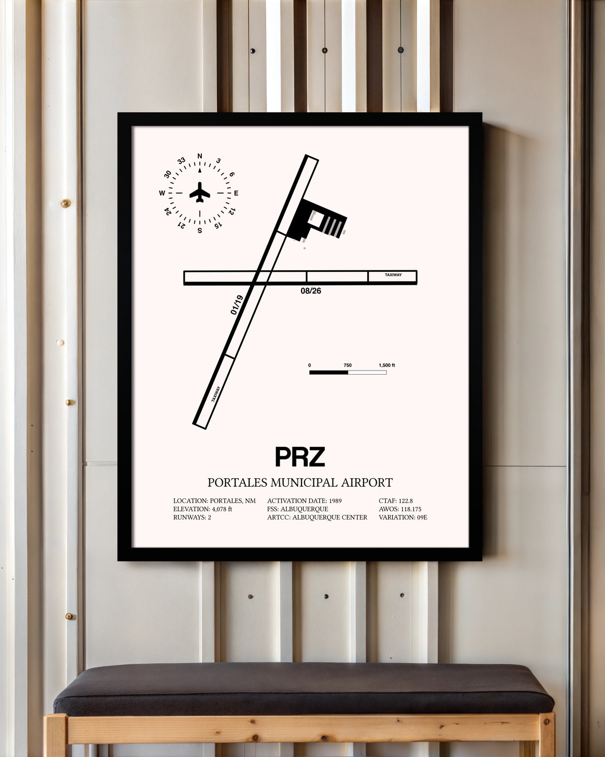 Portales Municipal Airport framed poster displayed in an airplane hangar