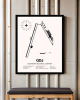 Granbury Regional Airport framed poster displayed in an airplane hangar