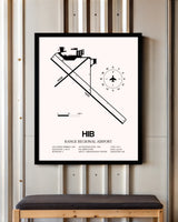 Range Regional Airport framed poster displayed in an airplane hangar