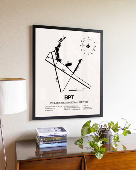Jack Brooks Regional Airport aviation wall décor in black wood frame