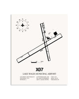 Gray Lake Wales Municipal Airport framed poster displayed in an airplane hangar